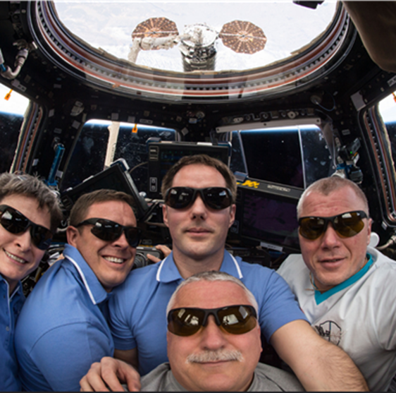 ISS Expedition 51 crew with glasses